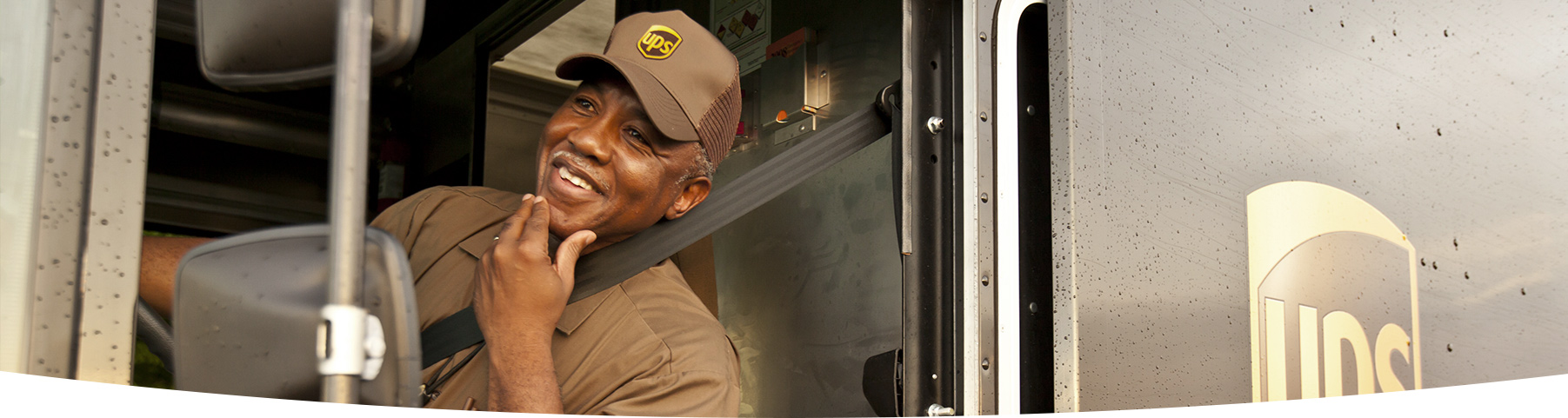 UPS driver smiling.